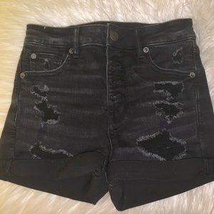 black ripped american eagle shorts